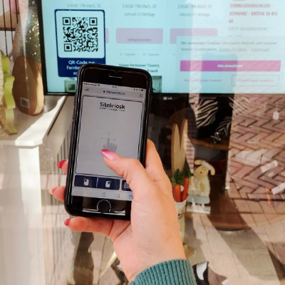 Remote control of kiosks with a mobile device